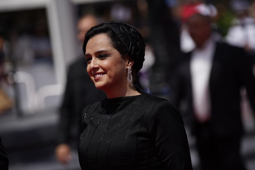 Taraneh Alidoosti poses for photographers upon arrival at the premiere of the film 'Leila's Brothers' at the 75th international film festival, Cannes, southern France, Wednesday, May 25, 2022. Iranian authorities arrested Alidoosti, one of the country’s most famous actresses on charges of spreading falsehoods about nationwide protests that grip the country, state media said Saturday, Dec. 17. (AP Photo/Daniel Cole, File)