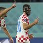 Croatia&#39;s Josko Gvardiol, right, celebrates after scoring his side&#39;s opening goal during the World Cup third-place playoff soccer match between Croatia and Morocco at Khalifa International Stadium in Doha, Qatar, Saturday, Dec. 17, 2022. (AP Photo/Francisco Seco)