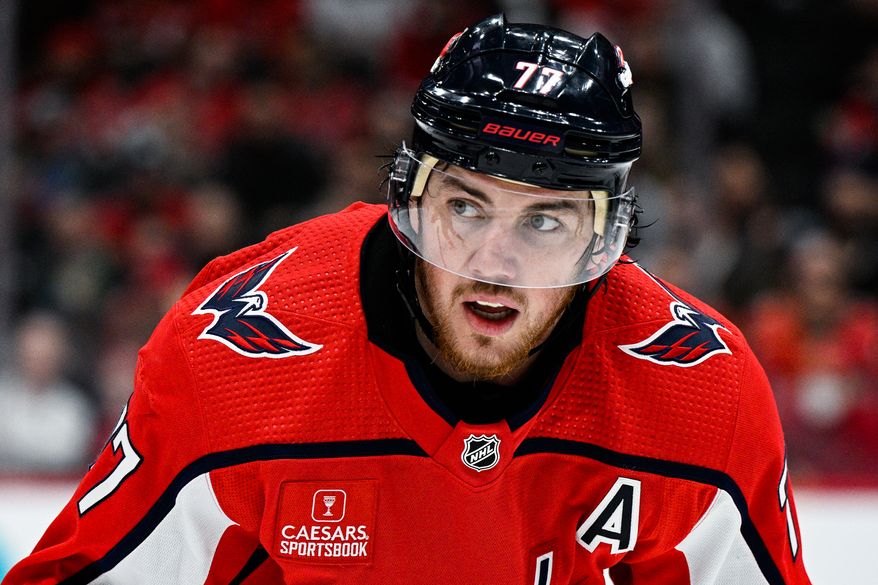 Washington Capitals right wing T.J. Oshie (77) lines up for a faceoff against the Dallas Stars at Capital One Arena, Washington, D.C., December 15, 2022. (Photo by Brian Murphy)
