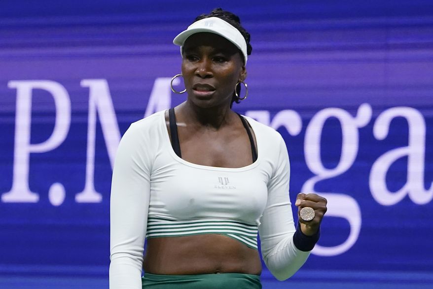 Venus Williams, of the United States, reacts during her first-round doubles match with Serena Williams, against Lucie Hradecka and Linda Noskova, of the Czech Republic, at the U.S. Open tennis championships on Sept. 1, 2022, in New York. Williams has been awarded a wild-card entry to play at the Australian Open in January 2023, 25 years after she played the Grand Slam tournament for the first time. (AP Photo/Frank Franklin II) **FILE**