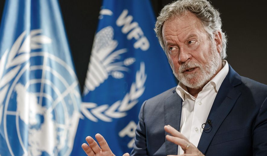 World Food Program Executive Director David Beasley speaks during an interview with The Associated Press at the WFP headquarters in Rome, Nov. 2, 2021. Beasley announced Saturday, Dec. 17, 2022, that he will step down from his role as executive director of the U.N. World Food Program, ending a six-year term heading the world’s largest humanitarian organization. (AP Photo/Domenico Stinellis, File)
