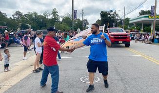 Republican Jarrod Lowery campaigns for a seat in the North Carolina state House in July at the 2022 Lumbee Homecoming Parade in Pembroke. (Photo courtesy of the Republican State Leadership Committee)