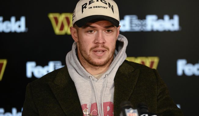 Washington Commanders quarterback Taylor Heinicke speaks during a news conference after a 20-12 loss to the New York Giants, Monday, Dec. 19, 2022, in Landover, Md. (AP Photo/Nick Wass)