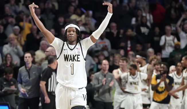 Wake Forest&#x27;s Tyree Appleby (1) celebrates in the closing seconds of the team&#x27;s 81-70 win over Duke in an NCAA college basketball game in Winston-Salem, N.C., Tuesday, Dec. 20, 2022. (AP Photo/Chuck Burton)
