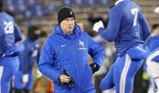 Air Force head coach Troy Calhoun looks on as players warm up before an NCAA college football game against Colorado State, Saturday, Nov. 19, 2022, at Air Force Academy, Colo. Baylor and Air Force will play in the Armed Forced Bowl on Dec. 22 in Fort Worth, Texas. (AP Photo/David Zalubowski, File)
