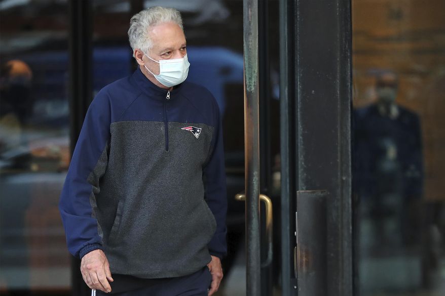 Former Harvard University fencing coach Peter Brand departs federal court in Boston, Nov. 16, 2020, after being arraigned and freed on bail. Brand was acquitted Wednesday, Dec. 21, 2022, of charges that he accepted more than $1.5 million in bribes in exchange for designating a wealthy businessman's two sons as recruits to help secure their admission to the elite university. (Jim Davis/The Boston Globe via AP) **FILE**