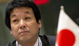 Japan&#39;s Vice Foreign Minister Kentaro Sonoura waits for the start of a round table meeting at an EU Syria conference at the Europa building in Brussels on April 5, 2017. Sonoura, a key governing party lawmaker in Japan who has served in key posts, has submitted his resignation over a political funding scandal in a fresh embarrassment for Prime Minister Fumio Kishida. (AP Photo/Virginia Mayo, File)