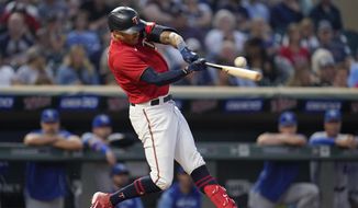 Minnesota Twins&#39; Carlos Correa hits an RBI double during the third inning of a baseball game against the Kansas City Royals, Tuesday, Sept. 13, 2022, in Minneapolis. (AP Photo/Abbie Parr, File) **FILE**