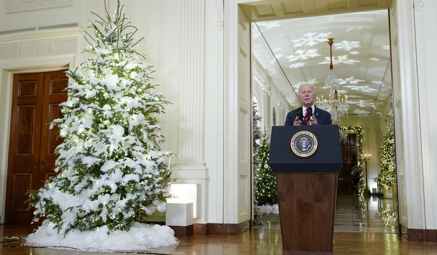 President Joe Biden speaks in the East Room of the White House ahead of the holidays, Thursday, Dec. 22, 2022, in Washington. (AP Photo/Patrick Semansky)