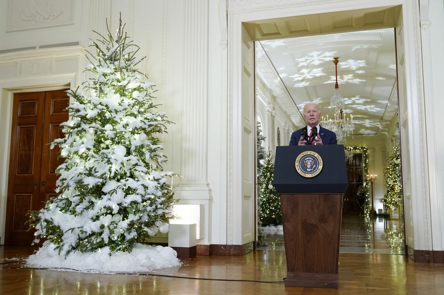 President Joe Biden speaks in the East Room of the White House ahead of the holidays, Thursday, Dec. 22, 2022, in Washington. (AP Photo/Patrick Semansky)