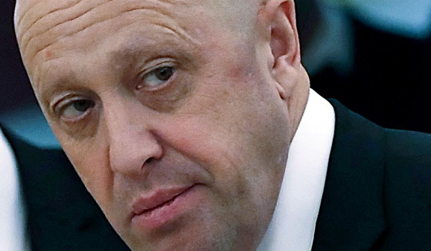 Russian businessman Yevgeny Prigozhin is shown prior to a meeting of Russian President Vladimir Putin and Chinese President Xi Jinping in the Kremlin in Moscow, Russia, July 4, 2017.  The White House said Thursday that the Wagner Group, a private Russian military company, has taken delivery of an arms shipment from North Korea to help bolster its forces as it fights side-by-side with Russian forces in Ukraine. The U.S. assesses that Wagner, owned by Putin ally Yevgeny Prigozhin, is spending about $100 million a month in the fight. (Sergei Ilnitsky/Pool Photo via AP, File)
