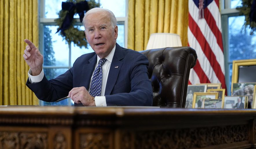 President Joe Biden participates in a briefing on winter storms across the United States in the Oval Office of the White House, Thursday, Dec. 22, 2022, in Washington. (AP Photo/Patrick Semansky)