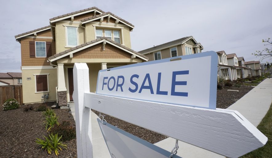 A For Sale sign is posted in front of a home in Sacramento, Calif., Thursday, March 3, 2022. On Thursday Freddie Mac reports on this week&#x27;s average U.S. mortgage rates. (AP Photo/Rich Pedroncelli, File)