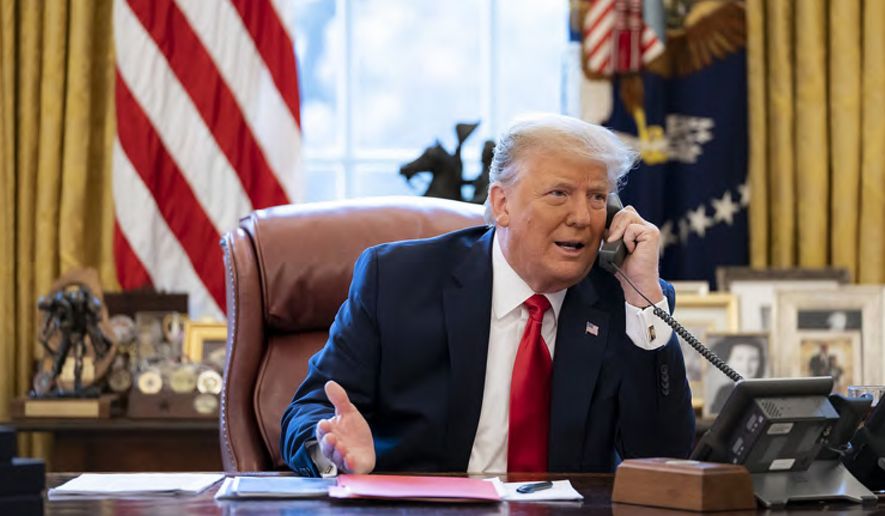 In this image released in the final report by the House select committee investigating the Jan. 6 attack on the U.S. Capitol, on Thursday, Dec. 22, 2022, President Donald Trump talks on the phone to Vice President Mike Pence from the Oval Office of the White House on the morning of Jan. 6, 2021. Congress has passed changes to the arcane law that controls how it ratifies the winner of a presidential election. The legislation is an effort to close loopholes that Trump and his allies tried to exploit so he could remain president after losing the 2020 presidential election to Joe Biden. (House Select Committee via AP)