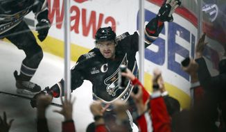 Washington Capitals left wing Alex Ovechkin (8) celebrates his goal during the first period of an NHL hockey game against the Winnipeg Jets, Friday, Dec. 23, 2022, in Washington. This was Ovechkin&#39;s 801st NHL goal. (AP Photo/Nick Wass)