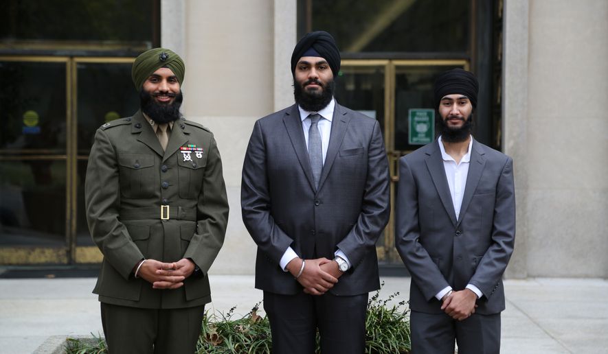 U.S. Marine Corps Capt. Sukhbir Singh Toor (left), and recruits Aekash Singh (center), and Jaskirat Singh (right) at the D.C. Circuit Court of Appeals in October when their appeal was heard. (Credit: Becket Fund for Religious Liberty, used with permission.)