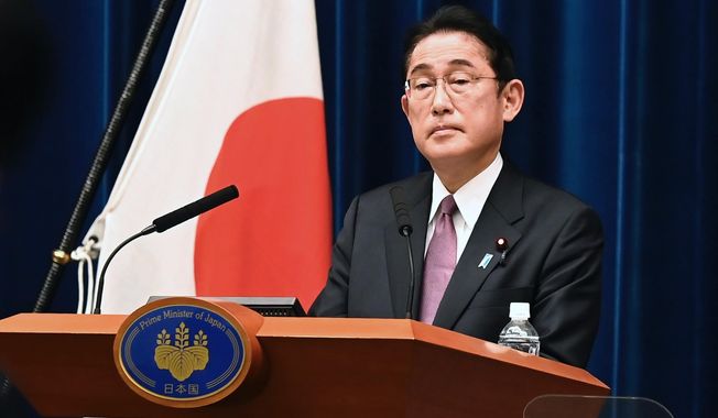 FILE - Japan&#x27;s Prime Minister Fumio Kishida attends a news conference at the prime minister&#x27;s official residence in Tokyo, on Dec. 16, 2022. Japan&#x27;s defense spending will jump 20% to a record 6.8 trillion yen ($55 billion) next year as the country prepares to deploy U.S.-made Tomahawks and other long-range cruise missiles that can hit targets in China or North Korea under a more offensive security strategy. (David Mareuil/Pool Photo via AP, File)