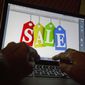 In this Dec. 12, 2016, photo, a person searches the internet for sales, in Miami. (AP Photo/Wilfredo Lee, File)