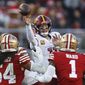 Washington Commanders quarterback Carson Wentz throws a pass as he is pressured by San Francisco 49ers linebacker Fred Warner (54) and cornerback Jimmie Ward (1) in the second half of an NFL football game, Saturday, Dec. 24, 2022, in Santa Clara, Calif. (AP Photo/Jed Jacobsohn)