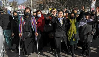 Afghan women chant slogans during a protest against the ban on university education for women, in Kabul, Afghanistan, Thursday, Dec. 22, 2022. The U.S. has condemned the Taliban for ordering non-governmental groups in Afghanistan to stop employing women, saying the ban will disrupt vital and life-saving assistance to millions. It is the latest blow to female rights and freedoms since the Taliban seized power last year and follows sweeping restrictions on education, employment, clothing and travel. (AP Photo, File)