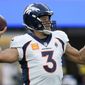 Denver Broncos quarterback Russell Wilson passes during the first half of an NFL football game between the Los Angeles Rams and the Denver Broncos on Sunday, Dec. 25, 2022, in Inglewood, Calif. (AP Photo/Marcio J. Sanchez)