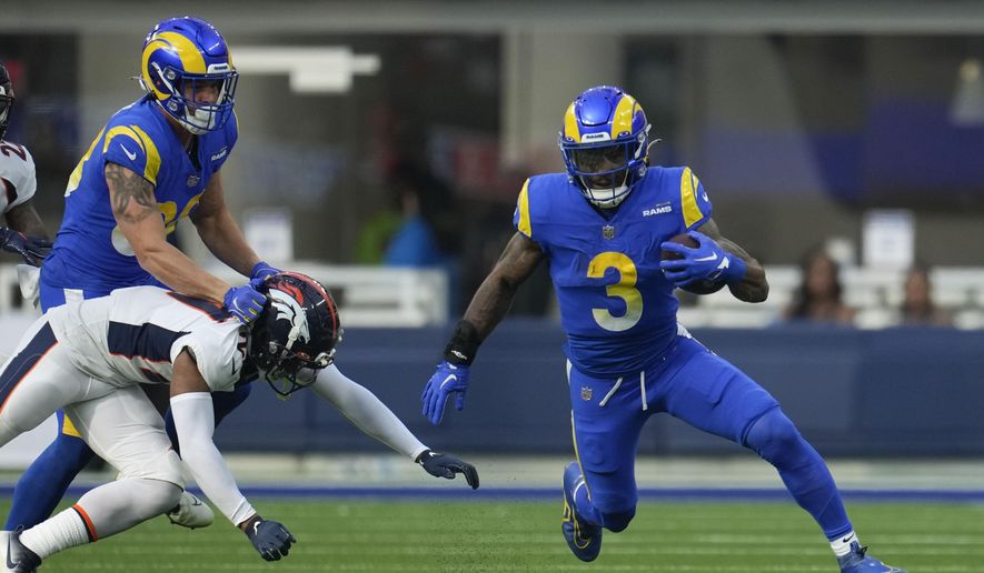 Los Angeles Rams running back Cam Akers runs during the first half of an NFL football game between the Los Angeles Rams and the Denver Broncos on Sunday, Dec. 25, 2022, in Inglewood, Calif. (AP Photo/Marcio J. Sanchez)