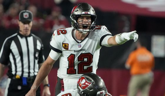 Tampa Bay Buccaneers quarterback Tom Brady (12) calls a play against the Arizona Cardinals during the second half of an NFL football game, Sunday, Dec. 25, 2022, in Glendale, Ariz. (AP Photo/Rick Scuteri) **FILE**