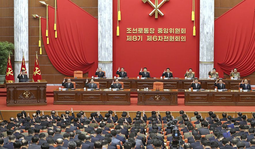 This photo provided by the North Korean government shows North Korean leader Kim Jong Un, left, attends a plenary meeting of the Workers’ Party of Korea at the party headquarters in Pyongyang, North Korea, on Dec. 26, 2022. Independent journalists were not given access to cover the event depicted in this image distributed by the North Korean government. The content of this image is as provided and cannot be independently verified. (Korean Central News Agency/Korea News Service via AP)