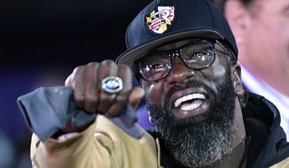 In this Nov. 3, 2019, file photo, former Baltimore Ravens safety Ed Reed displays his Pro Football Hall of Fame ring during a halftime ceremony at an NFL football game between the Ravens and the New England Patriots in Baltimore. Pro Football Hall of Famer Ed Reed has agreed to become the football coach at Bethune-Cookman and is leaving his job with the Miami Hurricanes, the schools announced Tuesday night, Dec. 27, 2022.(AP Photo/Nick Wass) **FILE**
