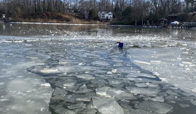 The Maryland State Police tweeted a photo on Dec. 26, 2022, of where &quot;a pilot was rescued from the icy water after crashing into Beards Creek in Anne Arundel County.&quot; (Image: MD State Police Twitter account/@MDSP)