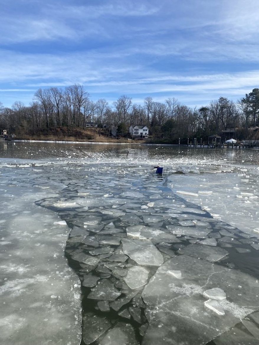 The Maryland State Police tweeted a photo on Dec. 26, 2022, of where &quot;a pilot was rescued from the icy water after crashing into Beards Creek in Anne Arundel County.&quot; (Image: MD State Police Twitter account/@MDSP)