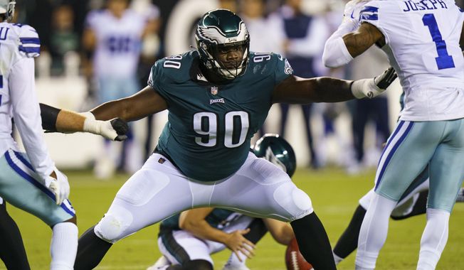 Philadelphia Eagles defensive tackle Jordan Davis (90) in action during the NFL football game against the Dallas Cowboys on Oct. 16, 2022, in Philadelphia. Davis was such a difference-maker in the middle of the Eagles’ defensive line the first two months of the season that the team needed to sign two former Pro Bowl players to replace him after the rookie sustained an ankle injury. (AP Photo/Christopher Szagola, File)