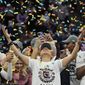 South Carolina head coach Dawn Staley celebrates after a college basketball game in the final round of the Women&#39;s Final Four NCAA tournament against UConn, April 3, 2022, in Minneapolis. South Carolina won 64-49 to win the championship. (AP Photo/Eric Gay, File) **FILE**