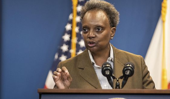 FILE - Chicago Mayor Lori Lightfoot speaks during a press conference in the Greektown neighborhood, of Chicago, Sept. 14, 2022. While the 2024 race for the White House is brewing, a scattering of states will hold elections next year. (Pat Nabong/Chicago Sun-Times via AP, File)