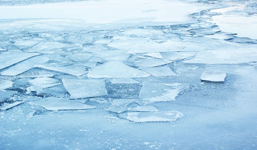 Frozen lake covered by ice. File photo credit: Valery Evlakhov via Shutterstock.