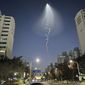 The light trail is seen in Goyang, South Korea, Friday, Dec. 30, 2022. South Korea&#x27;s military confirmed it test-fired a solid-fueled rocket on Friday, after its unannounced launch triggered brief public scare of a suspected UFO appearance or a North Korean missile or drone flying. (AP Photo/Ahn Young-joon)