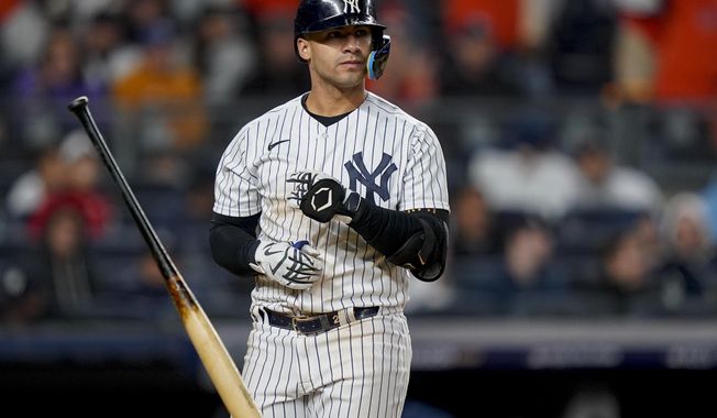 New York Yankees&#x27; Gleyber Torres tosses his bat after striking out against the Houston Astros to end the seventh inning of Game 4 of an American League Championship baseball series Oct. 23, 2022, in New York. The Yankees were among the teams who lost money for bettors in 2022. (AP Photo/John Minchillo, File)