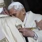 Pope Emeritus Benedict XVI, right, hugs Pope Francis in St. Peter&#x27;s Basilica during the ceremony marking the start of the Holy Year, at the Vatican, on Tuesday, Dec. 8, 2015. Pope Benedict XVIs 2013 resignation sparked calls for rules and regulations for future retired popes to avoid the kind of confusion that ensued. Benedict, the German theologian who will be remembered as the first pope in 600 years to resign, has died, the Vatican announced Saturday Dec. 31, 2022. He was 95. (AP Photo/Gregorio Borgia, File)