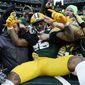 Green Bay Packers cornerback Keisean Nixon (25) celebrates with fans after returning a kickoff for a touchdown during the first half of an NFL football game against the Minnesota Vikings, Sunday, Jan. 1, 2023, in Green Bay, Wis. (AP Photo/Morry Gash)