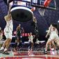 South Carolina guard Zia Cooke, second from right, shoots over Georgia guard Audrey Warren, right, during the second half of an NCAA college basketball game in Athens, Ga., Monday, Jan. 2, 2023. (AP Photo/Alex Slitz)