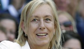 Tennis great Martina Navratilova is shown in the royal box on Centre Court at the All England Lawn Tennis Championships in Wimbledon, London, Saturday July 4, 2015. Navratilova said Monday, Jan. 2, 2023, that she has been diagnosed with throat cancer and breast cancer. In a statement released by her representative, the 18-time Grand Slam singles champion and member of the International Tennis Hall of Fame said her prognosis is good and she will start treatment this month. (AP Photo/Tim Ireland, File)