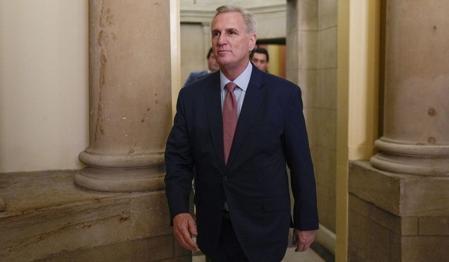 House Republican Leader Kevin McCarthy, R-Calif., walks from the speaker&#x27;s office on the opening day of the 118th Congress at the U.S. Capitol in Washington, Tuesday, Jan 3, 2023. (AP Photo/Carolyn Kaster)