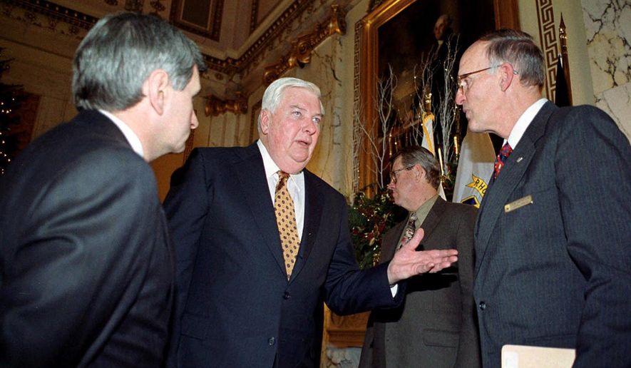 Rhode Island Gov. Lincoln Almond, center, speaks with U.S. Sen. Jack Reed, D-R.I., left, and Ronald Lambertson, regional director of the Fish and Wildlife Service, right, Wednesday, Dec. 22, 1999. Almond, the former two-term Republican governor of Rhode Island and longtime U.S. attorney in the state died Monday, Jan. 2, 2023, according to an obituary posted at the Avery-Storti Funeral Home and Crematory&#x27;s website. (AP Photo/Peter Ventrone, File)
