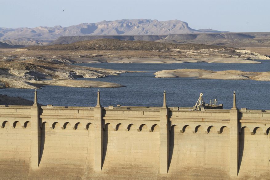 The level of Elephant Butte Lake near Truth or Consequences, N.M., continues to drop as drought persists on March 20, 2013. Reservoirs around New Mexico have been reduced to record-low levels as the state enters its third straight year of drought. A U.S. judge serving as special master in a legal battle over the management of one of North America's longest rivers has cleared the way for a proposed settlement to be made public. Under an order issued Friday, Dec. 30, 2022, the proposal reached by Texas, New Mexico and Colorado will be released in early January 2023 as attorneys prepare for an upcoming hearing on the merits of the proposal. (AP Photo/Susan Montoya Bryan, File)