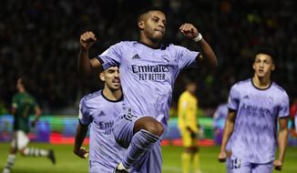 Real Madrid&#39;s Rodrygo celebrates after scoring the opening goal during a Spanish Copa del Rey round of 32 soccer match between Cacereno and Real Madrid at the Principe Felipe stadium in Caceres, Spain, Tuesday Jan. 3, 2023. (AP Photo/Pablo Garcia)