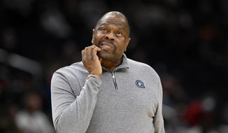 Georgetown head coach Patrick Ewing reacts after he called a time out during the second half of an NCAA college basketball game against Providence, Sunday, Feb. 6, 2022, in Washington. Georgetown basketball coach Patrick Ewing&#39;s loss-filled stint at his alma mater was called a “challenging and frustrating time&quot; by athletic director Lee Reed, who added Wednesday, Jan. 4, 2023, that “no one is more committed” to turning things around than the former star center. (AP Photo/Nick Wass, File) **FILE**