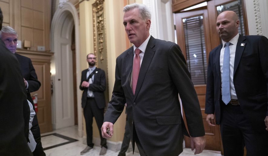 House Republican Leader Kevin McCarthy, R-Calif., leaves a private meeting room off the floor as he negotiates with lawmakers in his own party to become the speaker of the House, at the Capitol in Washington, Thursday, Jan. 5, 2023. (AP Photo/J. Scott Applewhite)