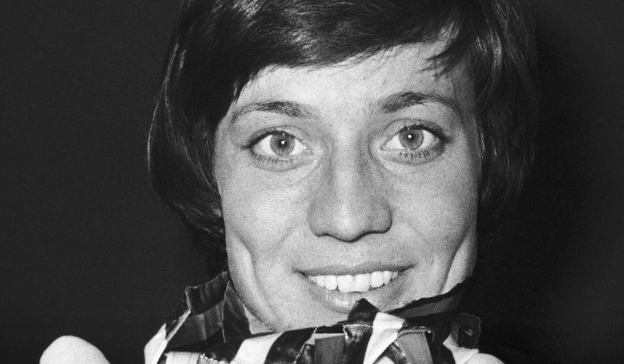 German alpine ski racer Rosi Mittermaier shows two gold medals and one silver, she won at the Winter Olympic Games at the Olympic village in Innsbruck, Austria, February 15, 1976. Rosi Mittermaier, who won downhill and slalom gold medals at the 1976 Winter Olympics and narrowly missed a sweep of all three women&#39;s Alpine skiing events at the Games, has died. She was 72. (AP Photo/Michel Lipchitz, File)