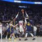Detroit Pistons forward Saddiq Bey shoots the game-winning 3-point basket against the Golden State Warriors in an NBA basketball game in San Francisco, Wednesday, Jan. 4, 2023. (AP Photo/Jeff Chiu)