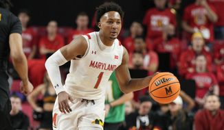 Maryland guard Jahmir Young (1) dribbles the ball during the second half of the team&#39;s NCAA college basketball game against UMBC Thursday Dec. 29, 2022, in College Park, Md. (AP Photo/Jess Rapfogel) **FILE**